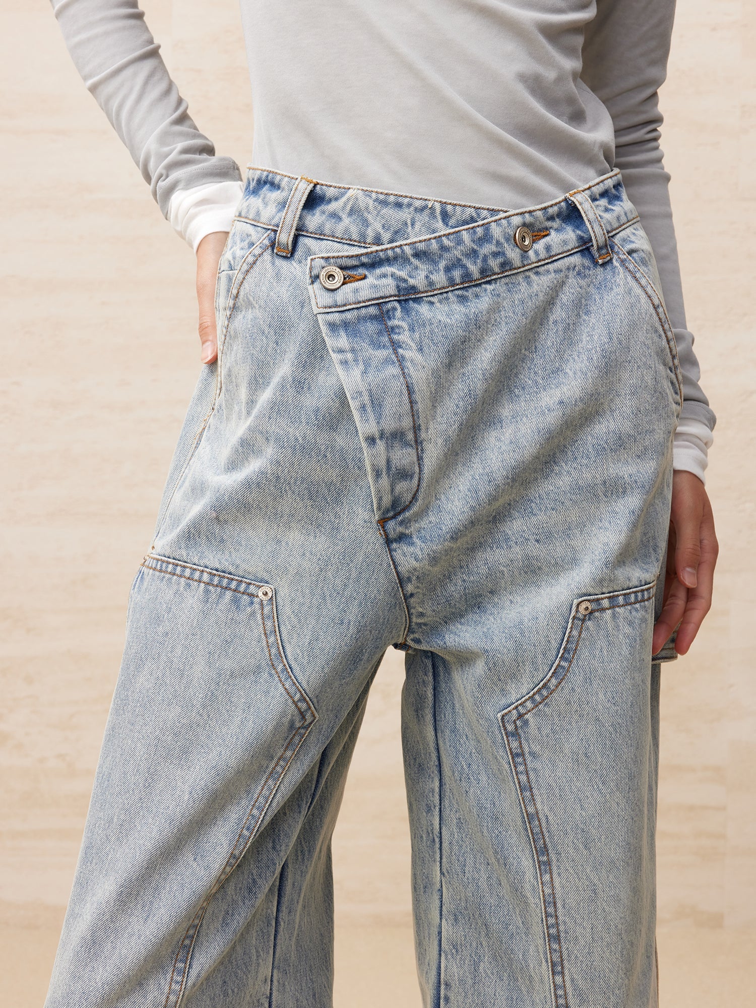 Deconstructed washed carpenter jeans