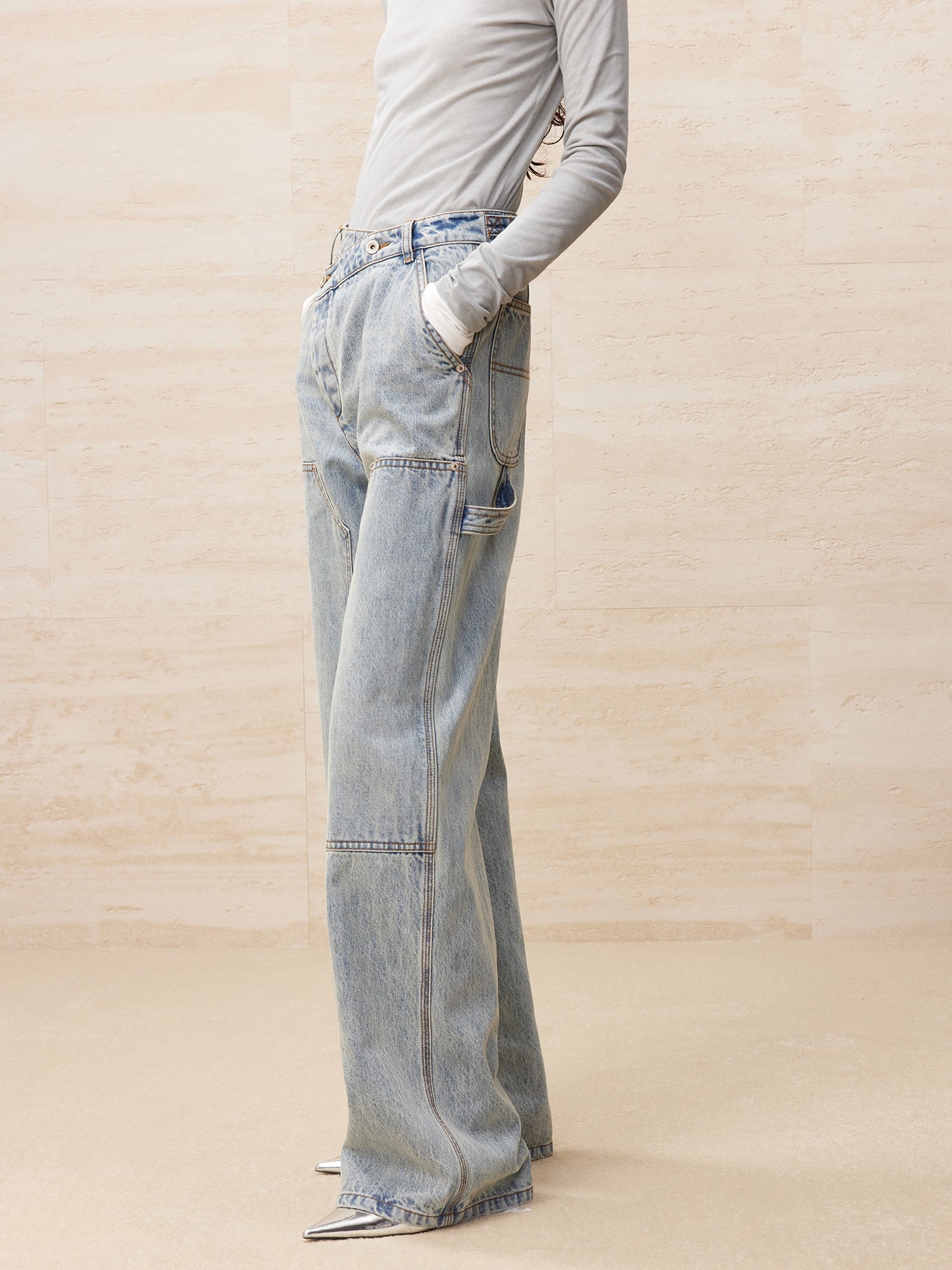 Deconstructed washed carpenter jeans