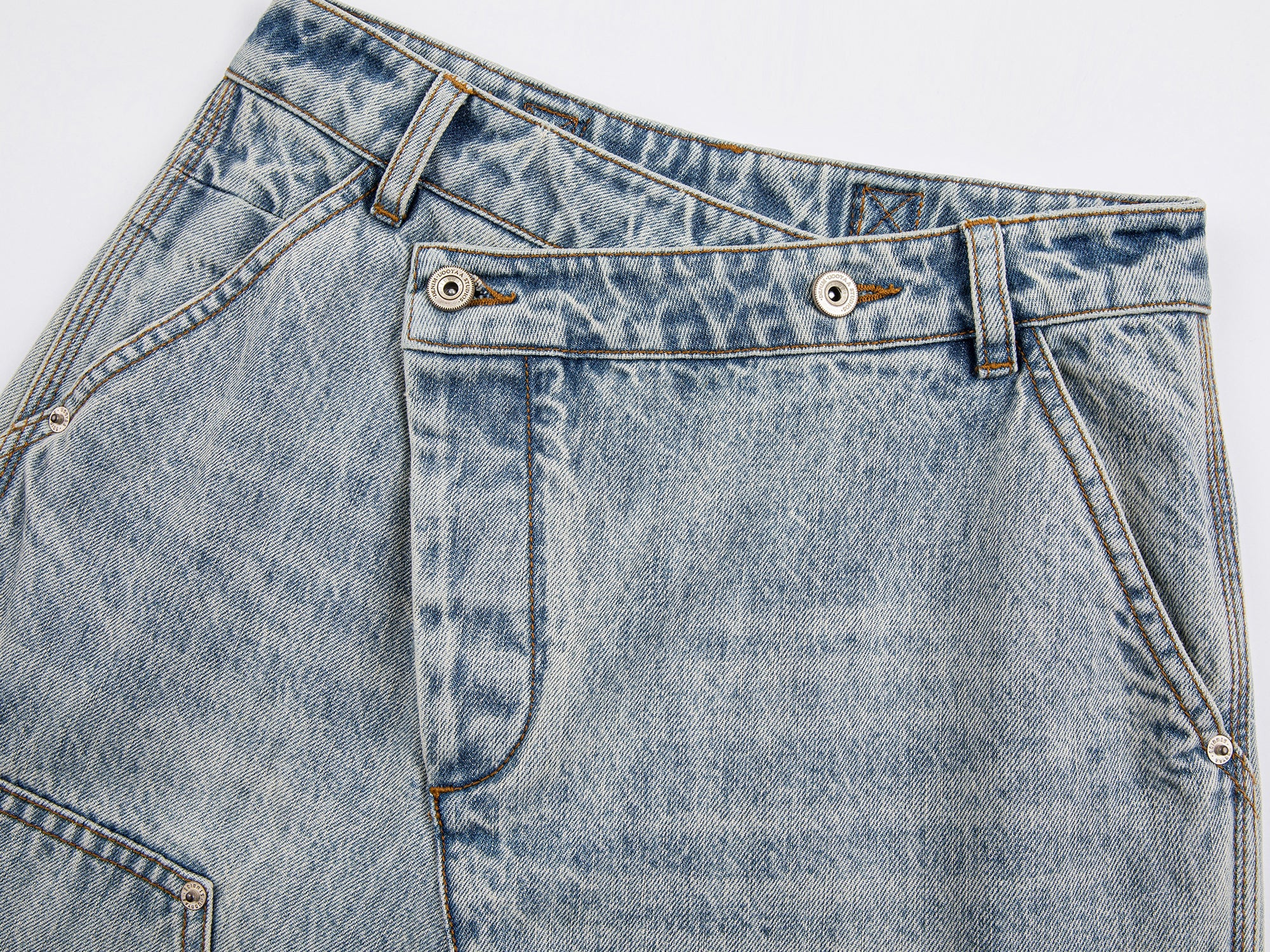 Deconstructed washed carpenter jeans