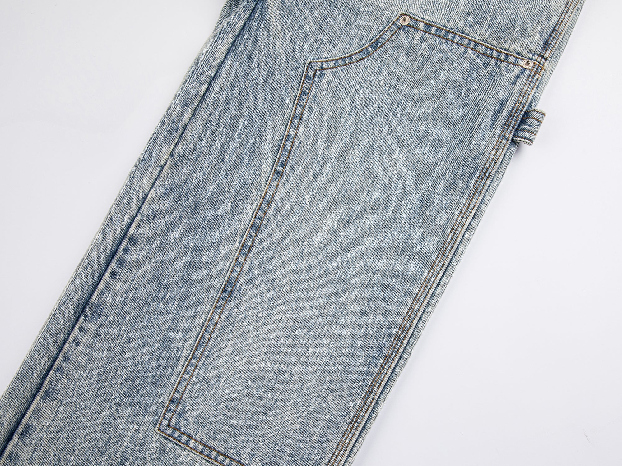 Deconstructed washed carpenter jeans