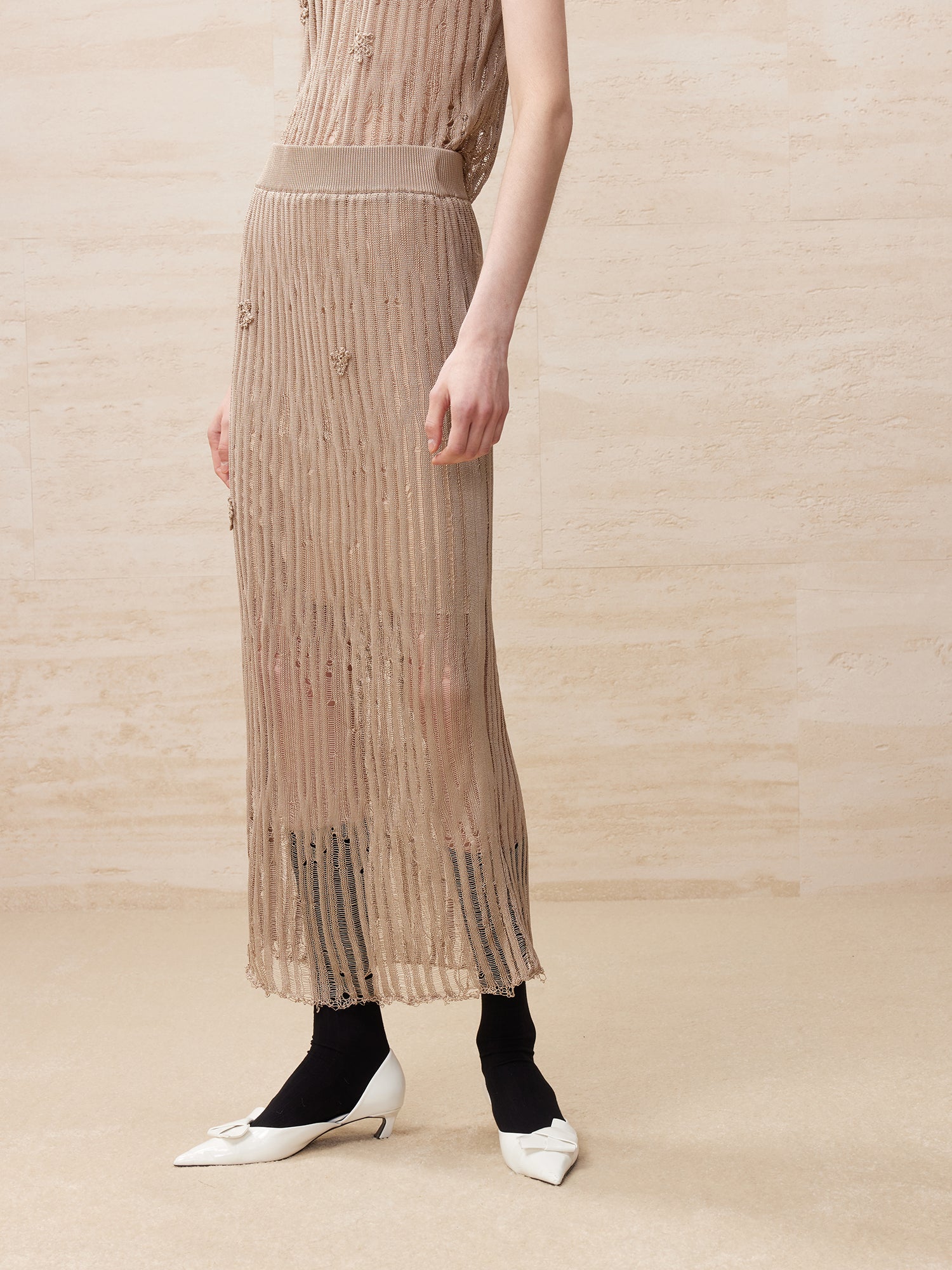 Knitted striped raw edge long skirt