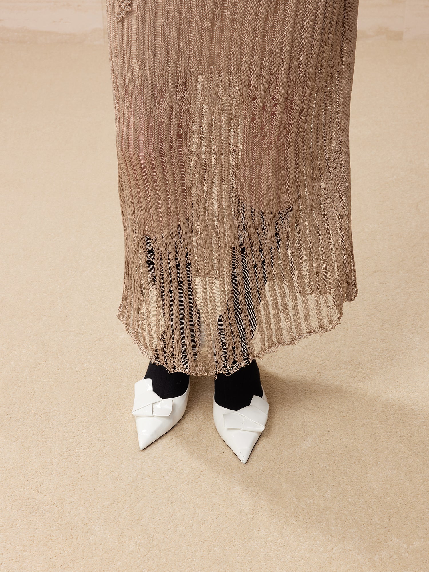 Knitted striped raw edge long skirt